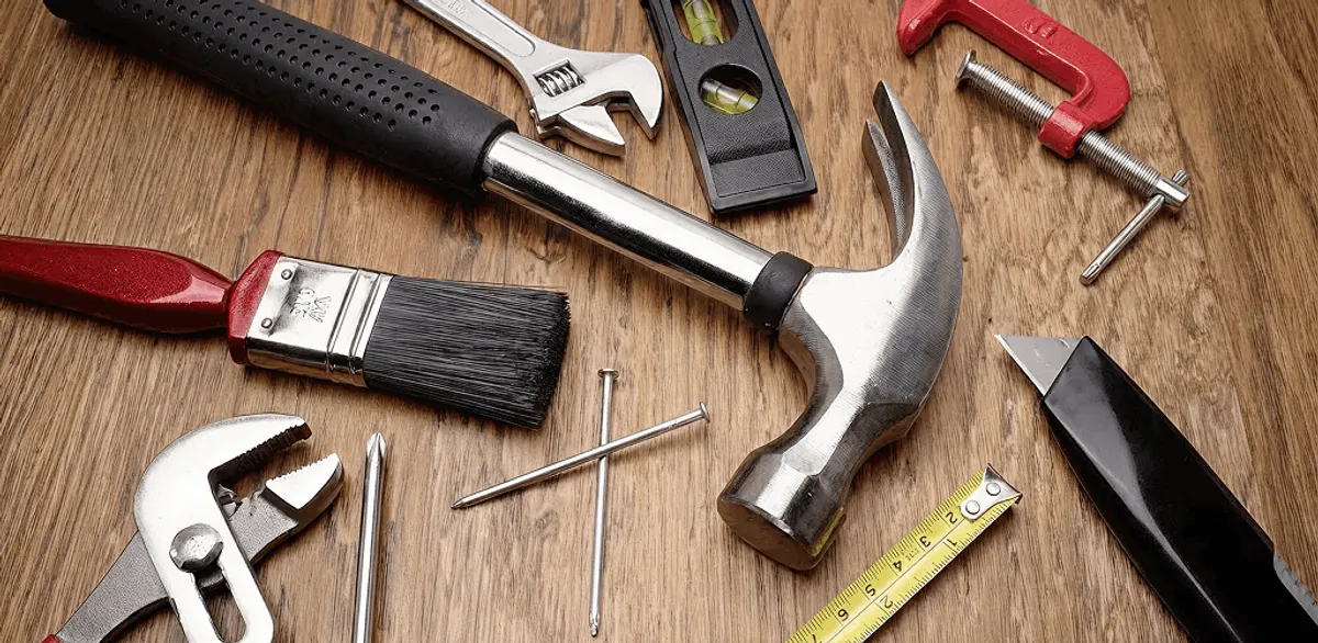 Handyman tools laid out for home repair and maintenance work in Huntsville, AL